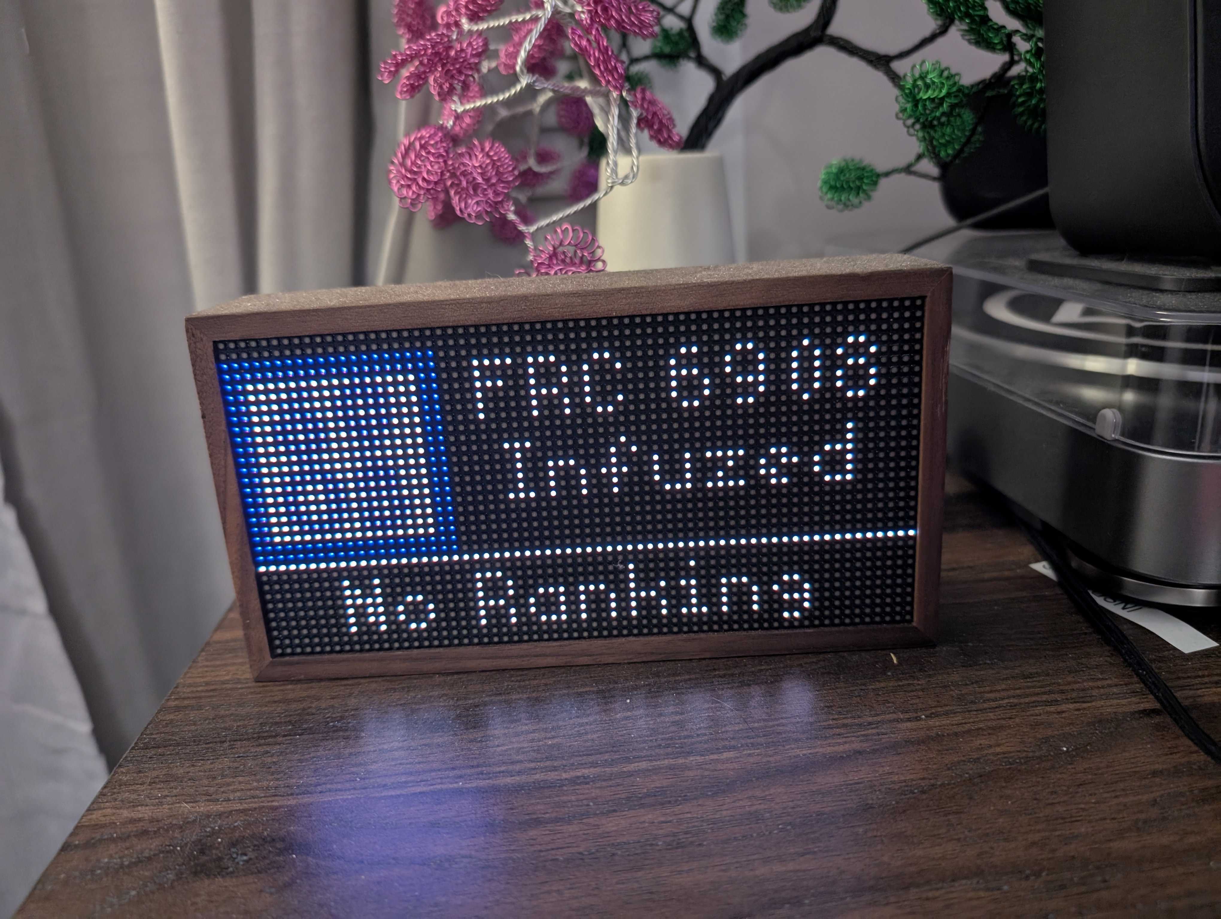 The FRC Team Rank app running on an actual tidbyt, displaying the rank (or lacktherof) of Team 6908-Infuzed 
